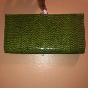 Green clutch with gold chain strap